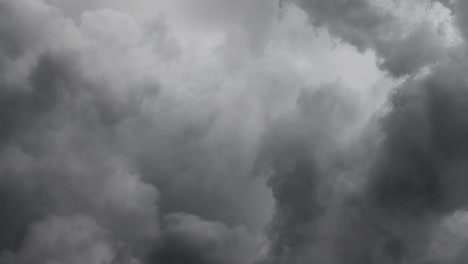 4k  clouds accompanied by lightning strikes