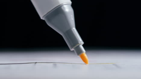 close-up of a highlighter marking on paper
