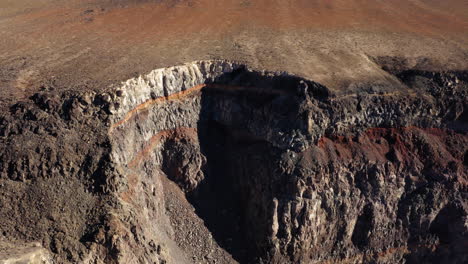 Close-up-view-backward-movement-shot-of-different-layers-of-lava-rocks-in-star-wars-canyon-located-in-California,USA-created-by-erosion