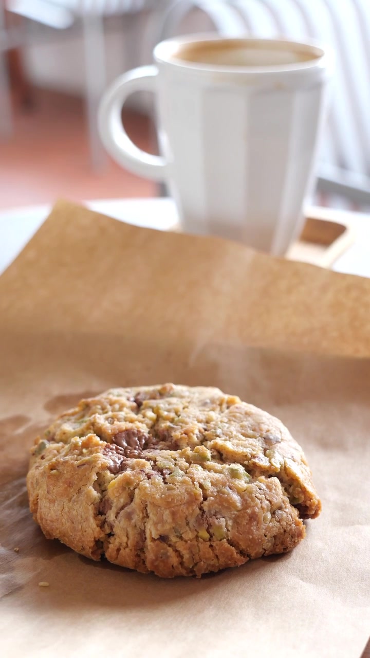 Freshly Baked Warm Cookie with Steaming Coffee