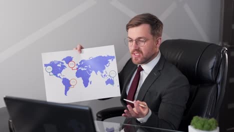 man in business suit makes presentation on world map