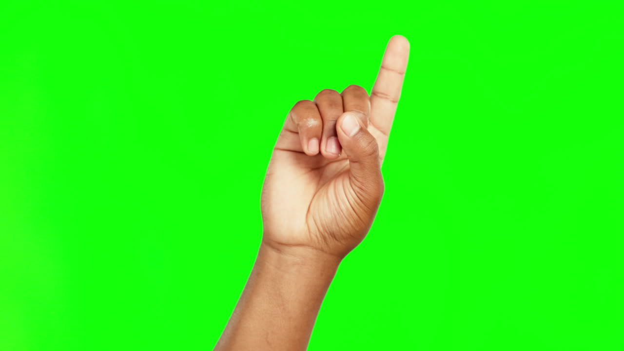 dedo, punto y pantalla verde en el estudio de primer plano
