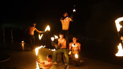 performers display fire skills on krabi beach