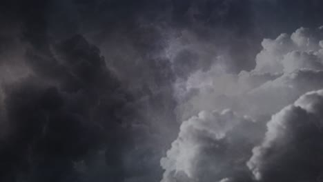 Dark-clouds-and-lightning-strikes-in-the-dark-sky