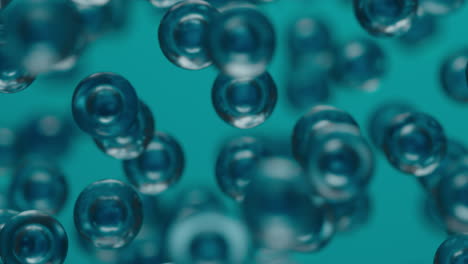 abstract blue and teal spheres floating - microscopic bubbles