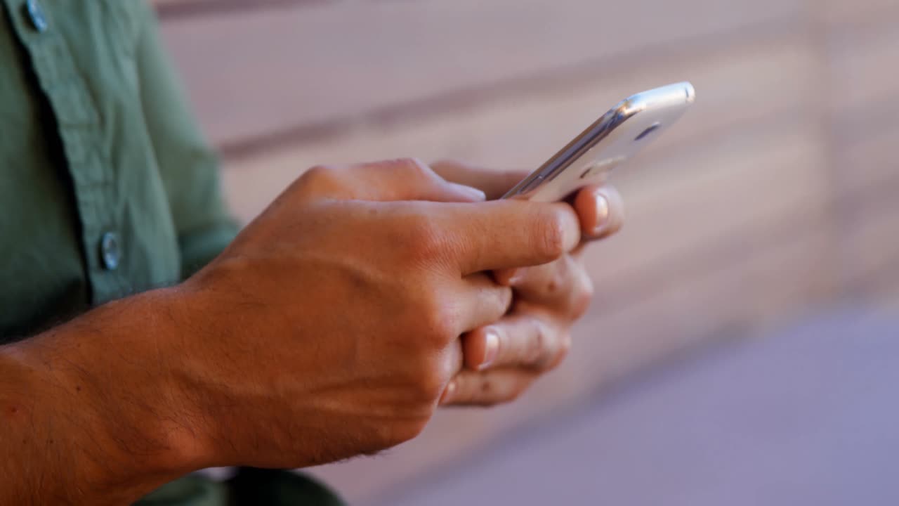 Man using mobile phone 4k