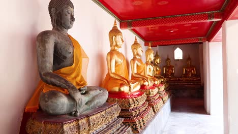 golden buddha statues in serene temple setting