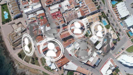 animation of ring of people icons rotating over aerial view modern buildings