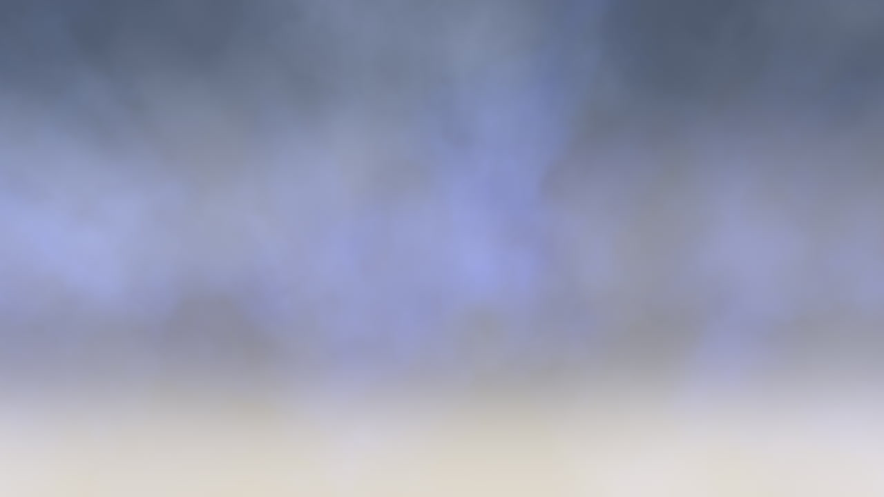 Vibrant sunset sky with blurry clouds a mix of orange, yellow, and blue