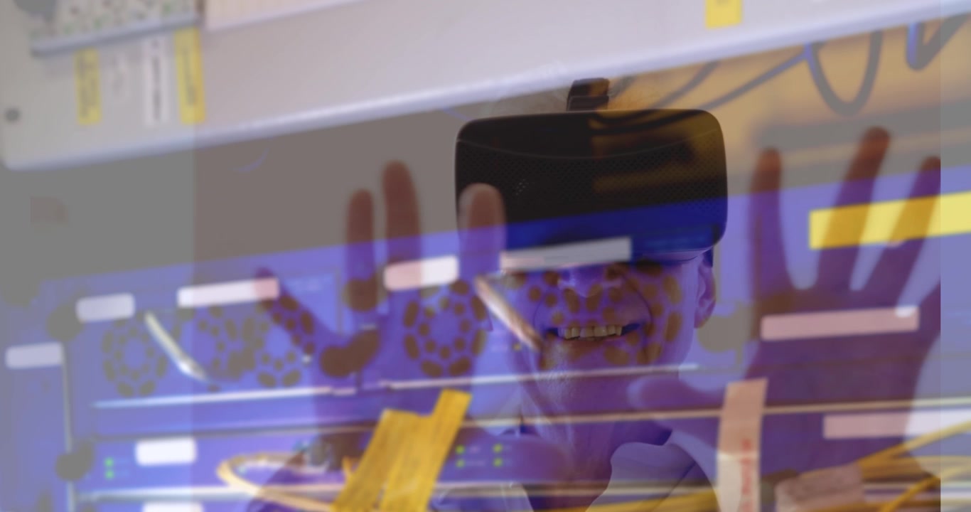 Senior Man Using Virtual Reality Headset in Server Room