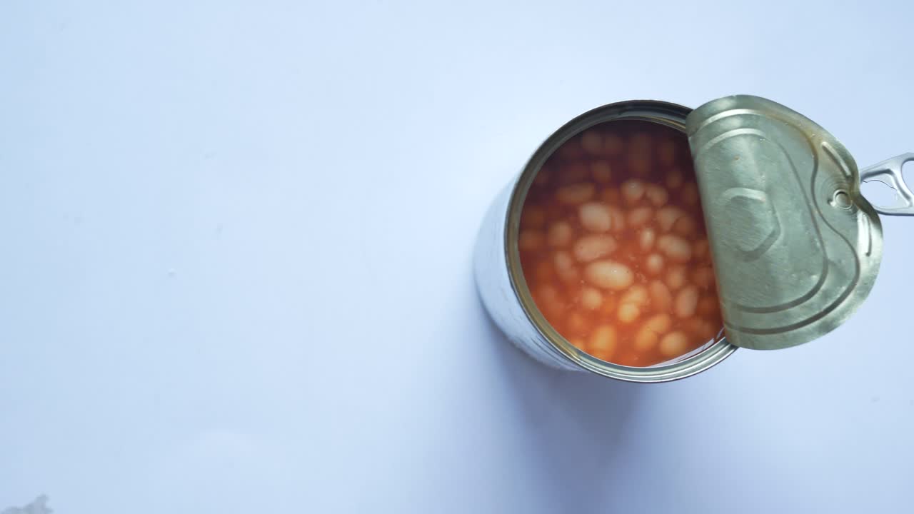 Open can of baked beans