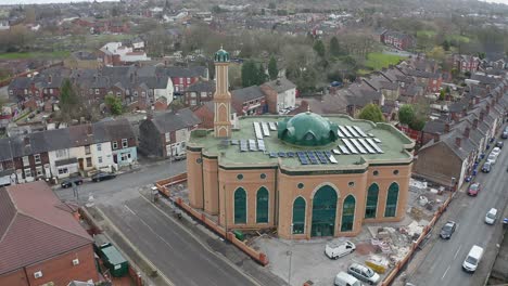 Aerial-view-of-Gilani-Noor-Mosque-in-Longton,-Stoke-on-Trent,-Staffordshire,-the-new-Mosque-being-built-for-the-growing-muslim-community-to-worship-and-congregate