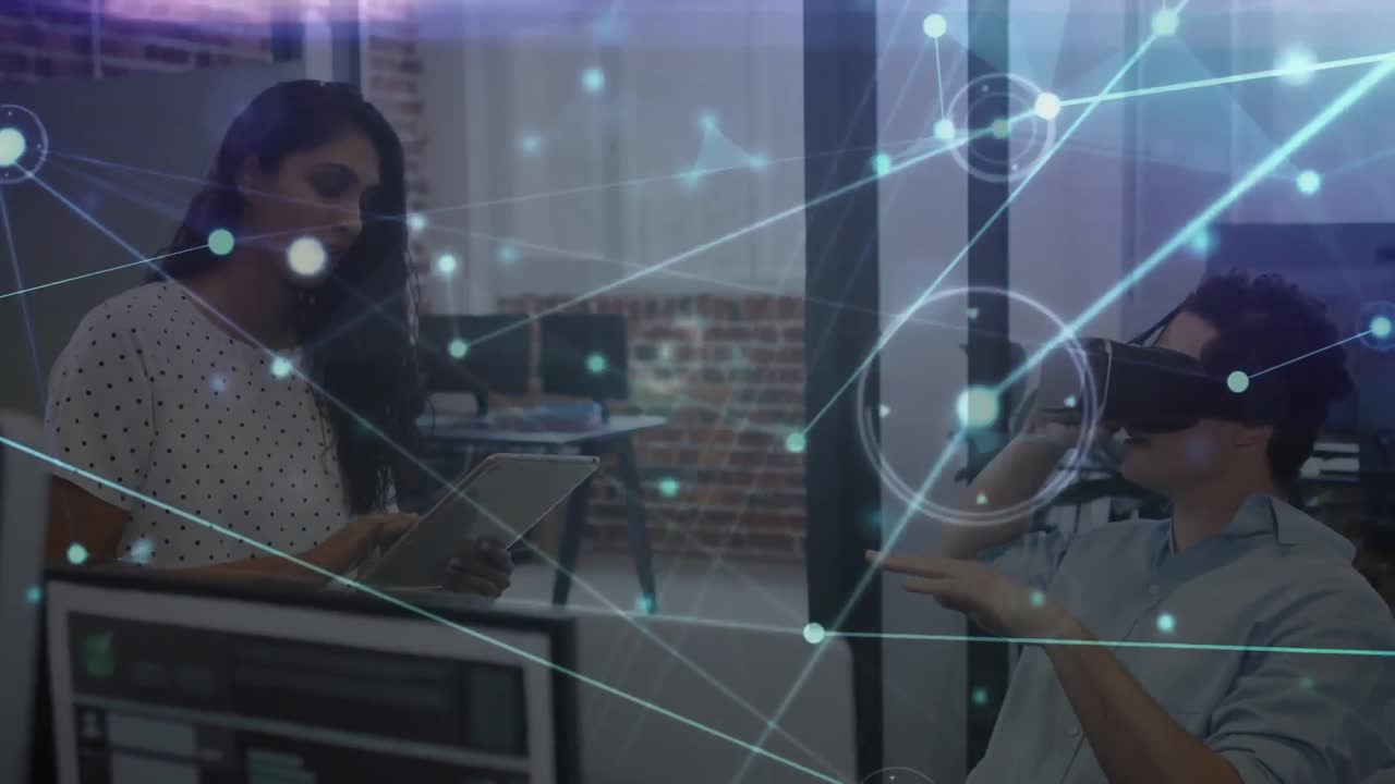 Animation of glowing network over business colleagues using tablet and vr headset in office