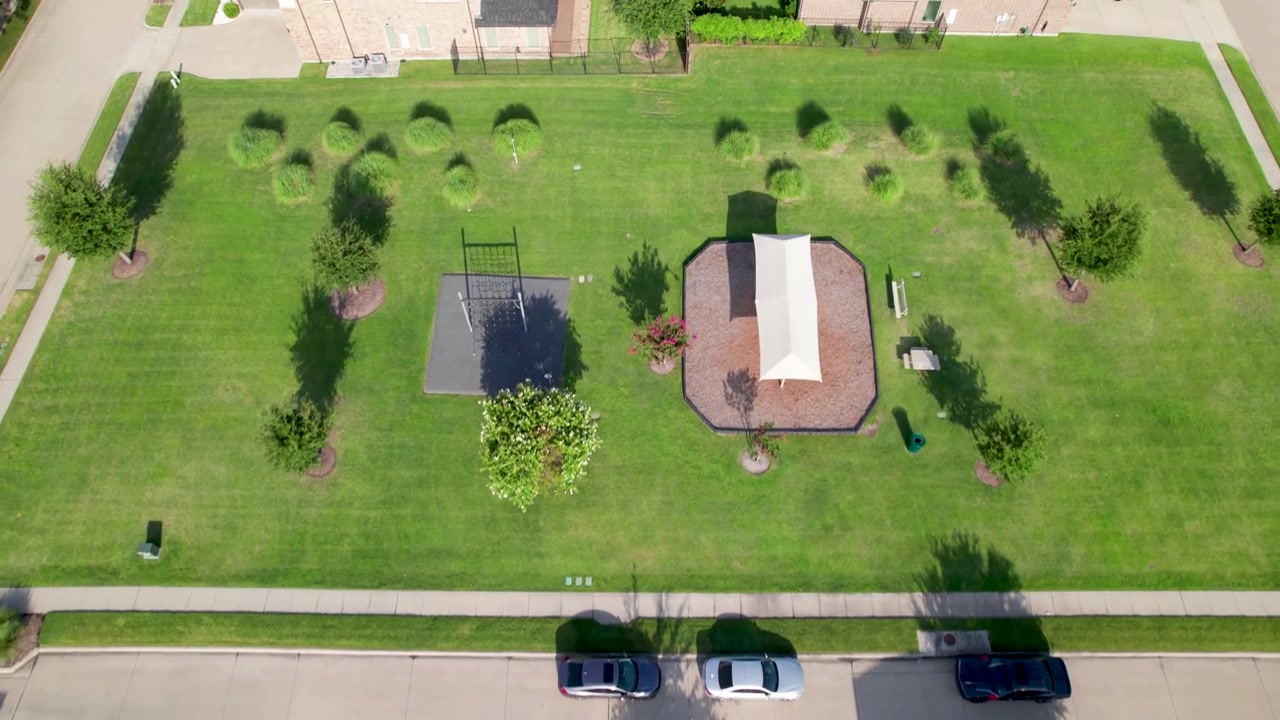 Aerial video of a park inside a community located at 5998 Burnham Dr, McKinney, TX 75070