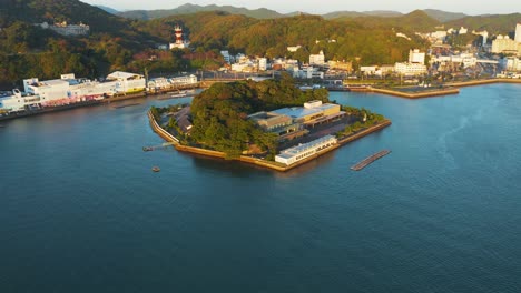 4k-Aerial-Pan-Reveal-of-Mikimoto-Pearl-Island-and-Toba-Bay,-Mie