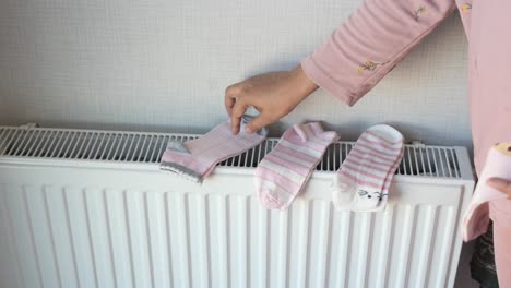 drying socks on a radiator