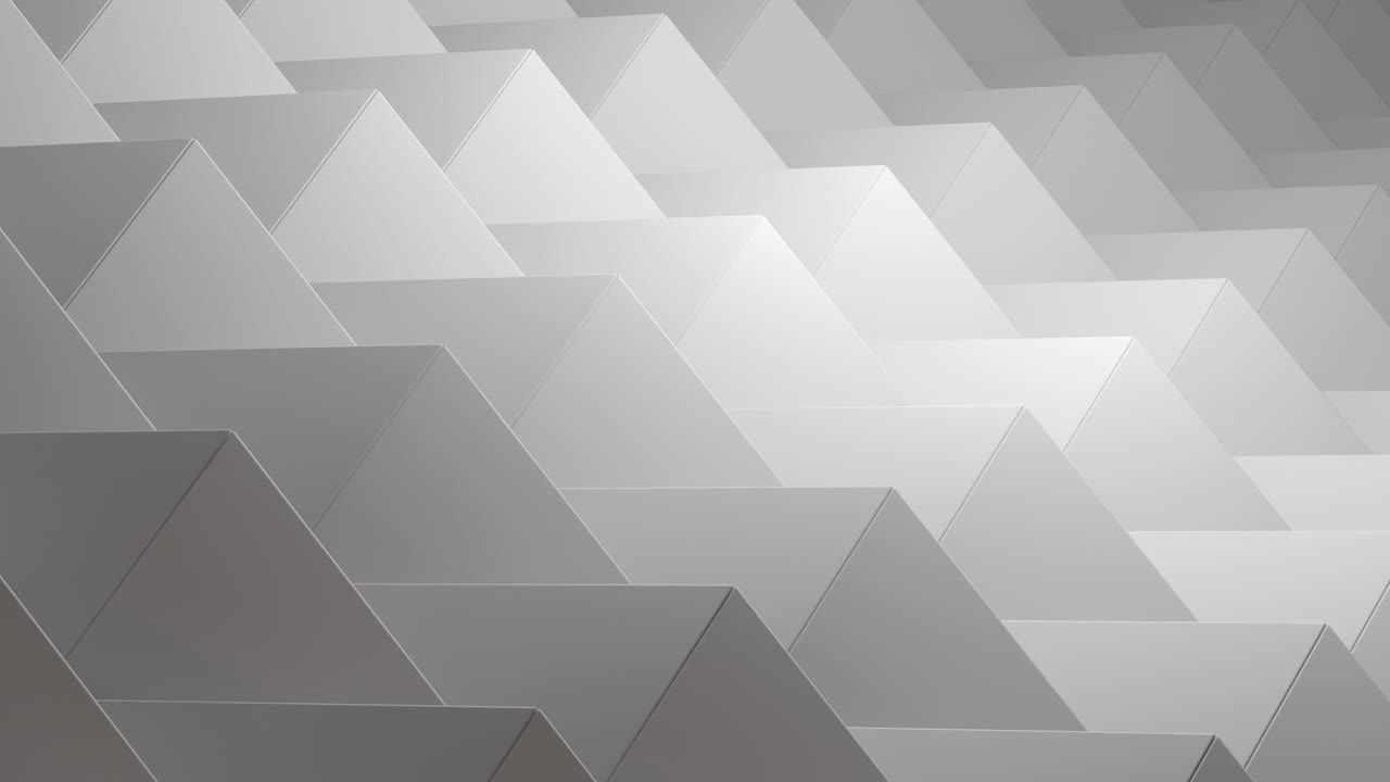 Seamless loop of grey and white triangles.