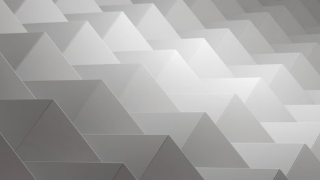 seamless loop of grey and white triangles.