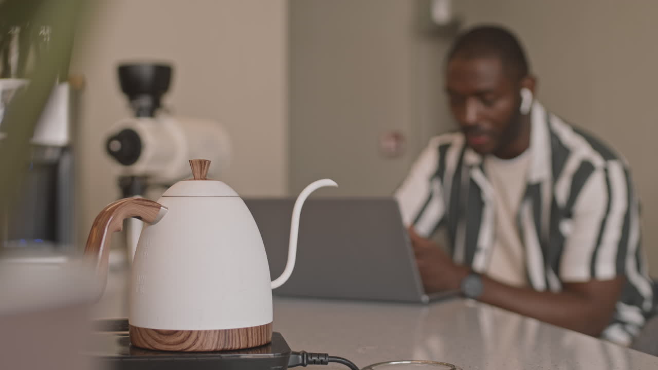 Afro American Businessman Working in Coffee Shop