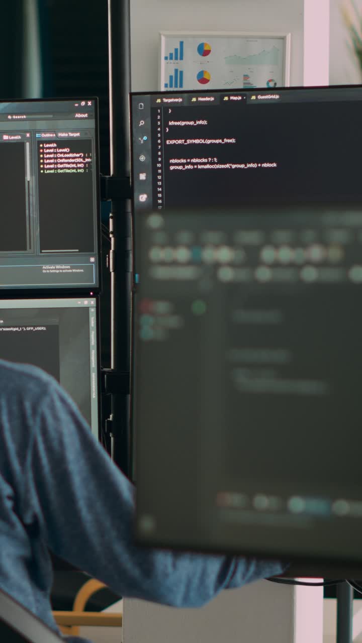 Vertical video: Database programer writing code on terminal window