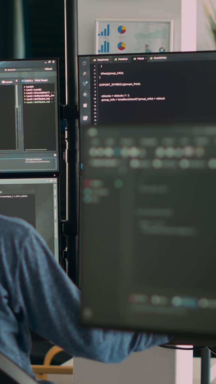 Vertical video: Database programer writing code on terminal window