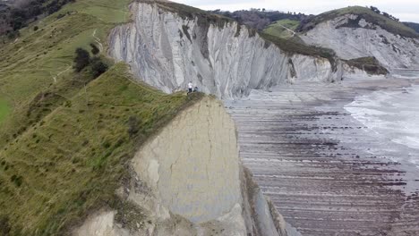 aerial drone view of the coast flysch structure in the beach of sakoneta in the basque country