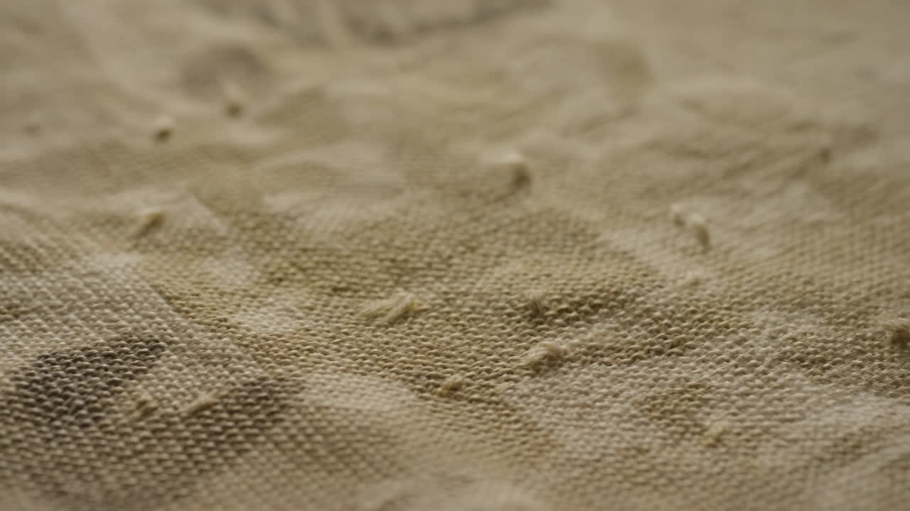 Detail textury přírodní béžové látky