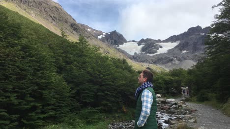 pov: young latin man enjoying his vacation in ushuaia, argentina patagonia.