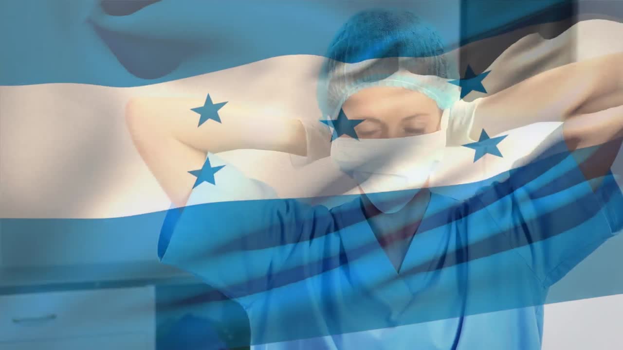 bandera de honduras ondeando sobre una trabajadora de salud de alto nivel que lleva una máscara facial en el hospital