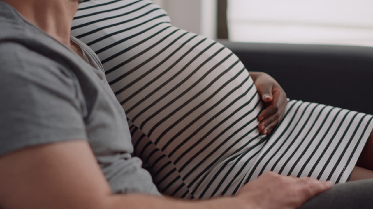 Close up of african american woman with baby bump