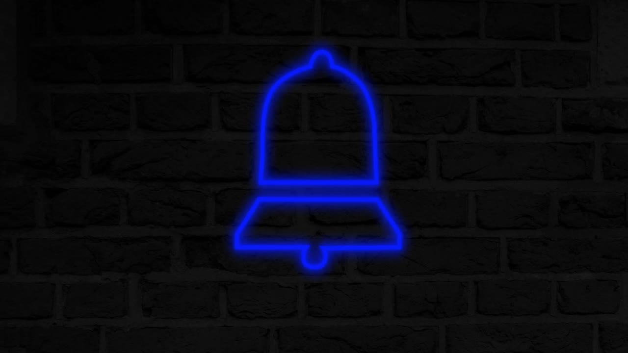 벽돌 벽 4k에 네온 표지판을 내려 놓습니다.