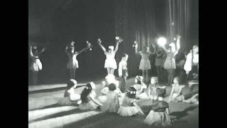 soviet children standing on top of a stage. circa ussr 1970: soviet children standing on top of a stage
