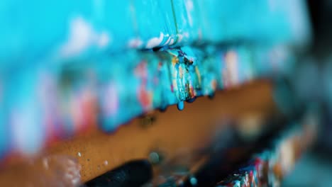 wet paint dripping from the table of the artist painter