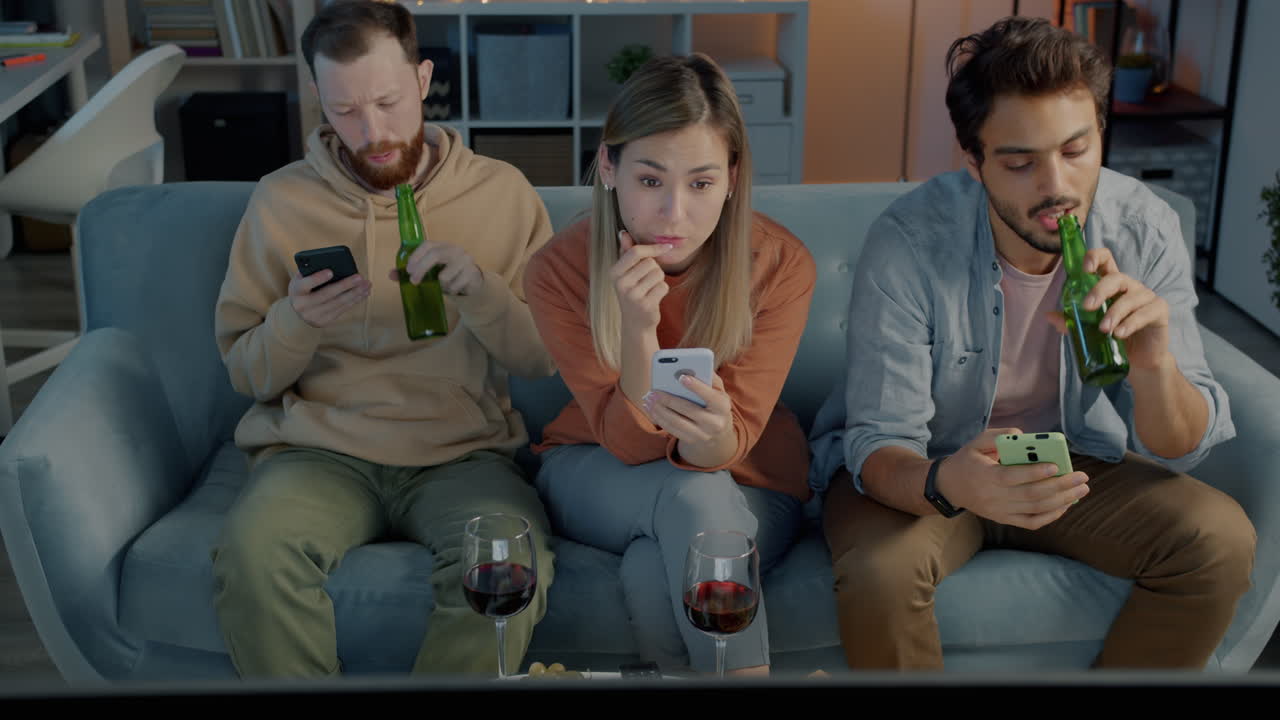 Friends Relaxing and Watching TV