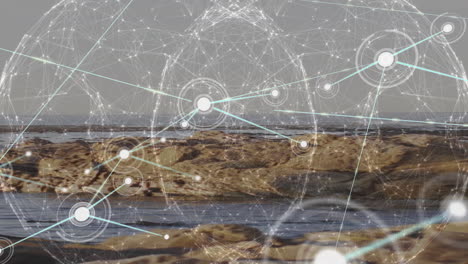 animación de la red de conexiones que transfieren datos sobre el paisaje costero