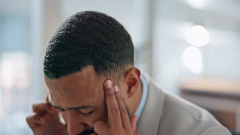 Businessman,-headache-and-take-off-glasses