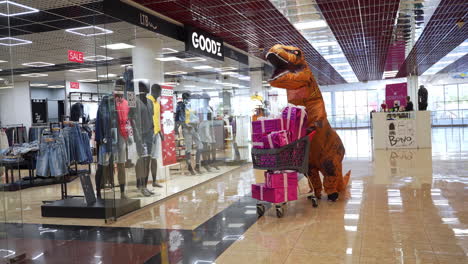 dinosaur shopping spree in a mall