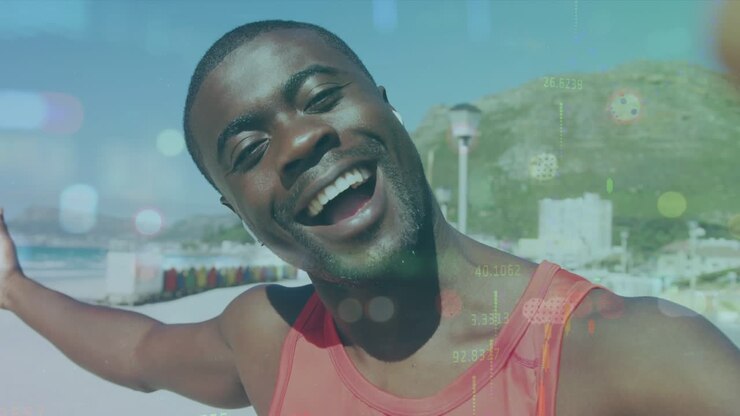 Animazione di dati in movimento su un giovane uomo africano felice che indica la spiaggia mentre si gode la musica