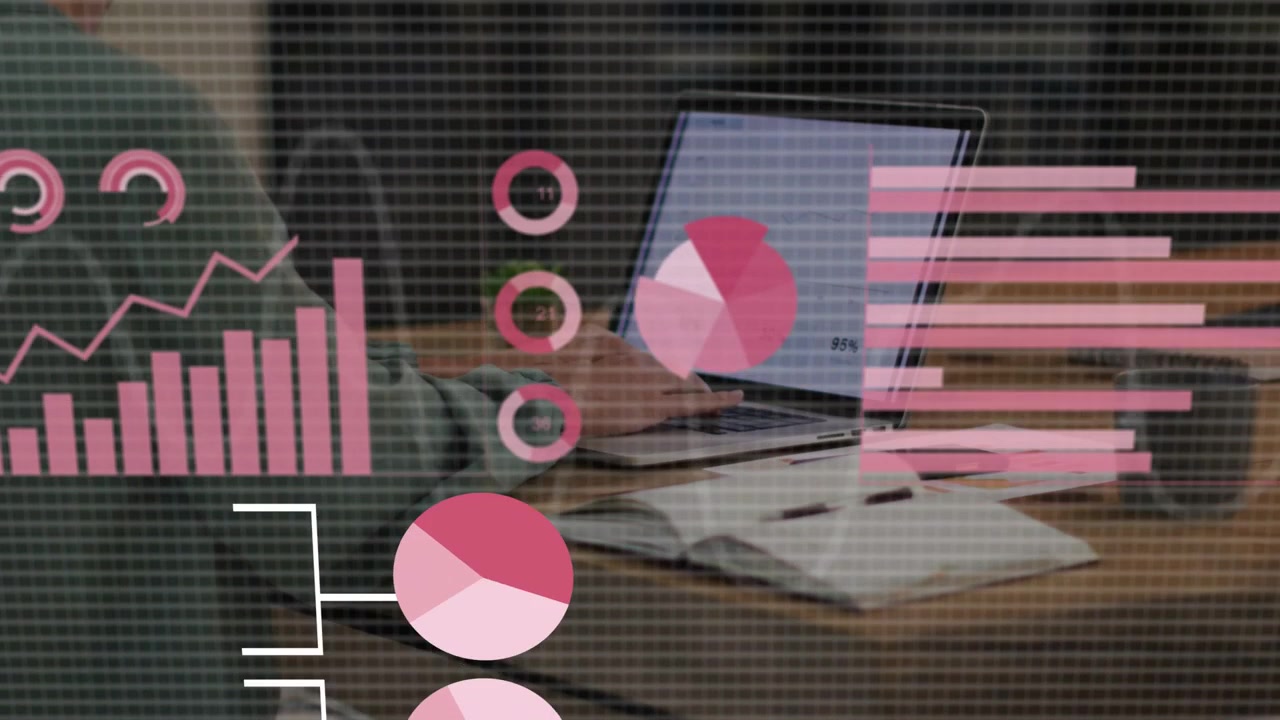 Woman typing on laptop at desk, initiating pink charts building over desk for tech analytics