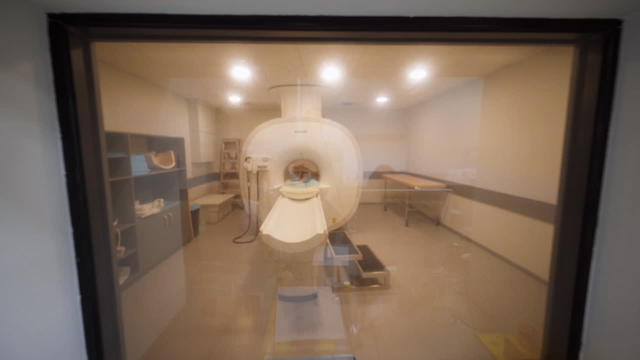 Medical Professionals Working in an MRI Room | Premium Stock Video Footage