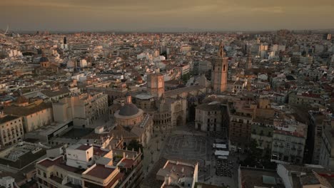 aerial view of landmark cathedral and old historic town of valencia, spain, during sunset