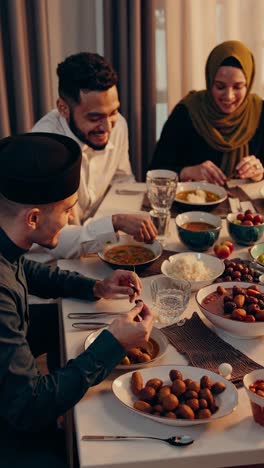 happy muslim family dinner