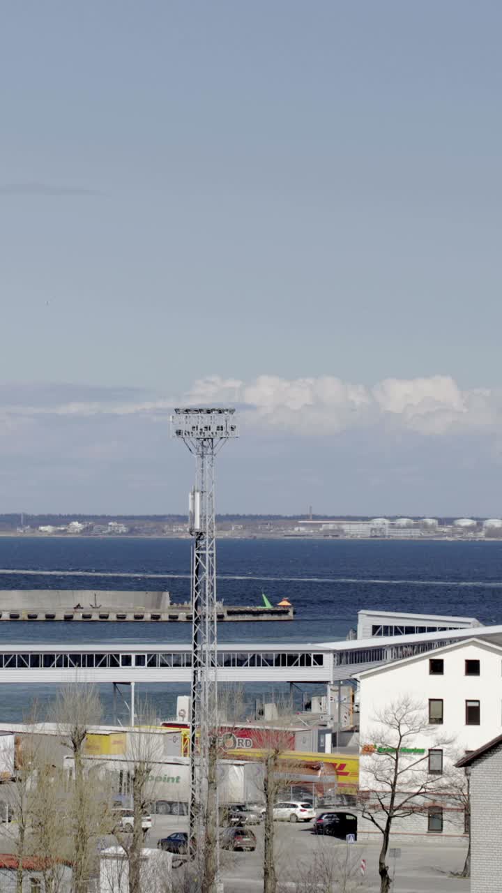 Views of the sea with ferries and industrial infrastructure