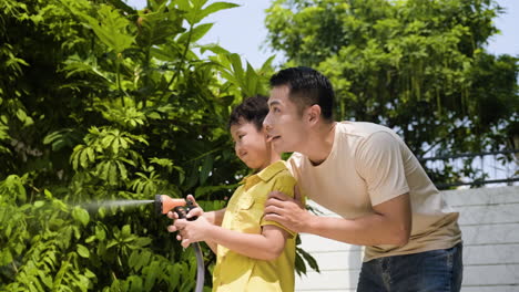 Asian-man-and-boy-in-the-backyard