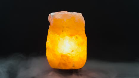 salt lamp smoke black background