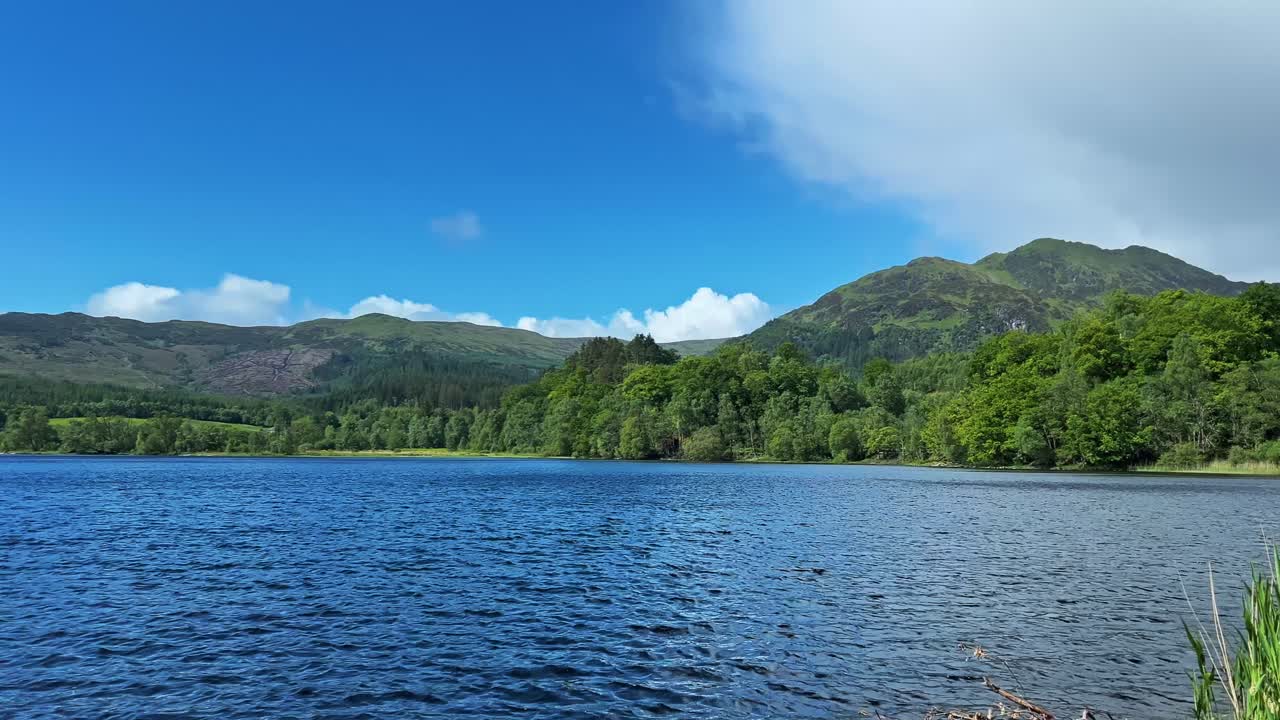 Picturesque View Of Seascape And Mountain Ridge In Scotland. Panning Shot
