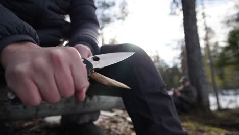 carving skewer with sharp knife, close-up
