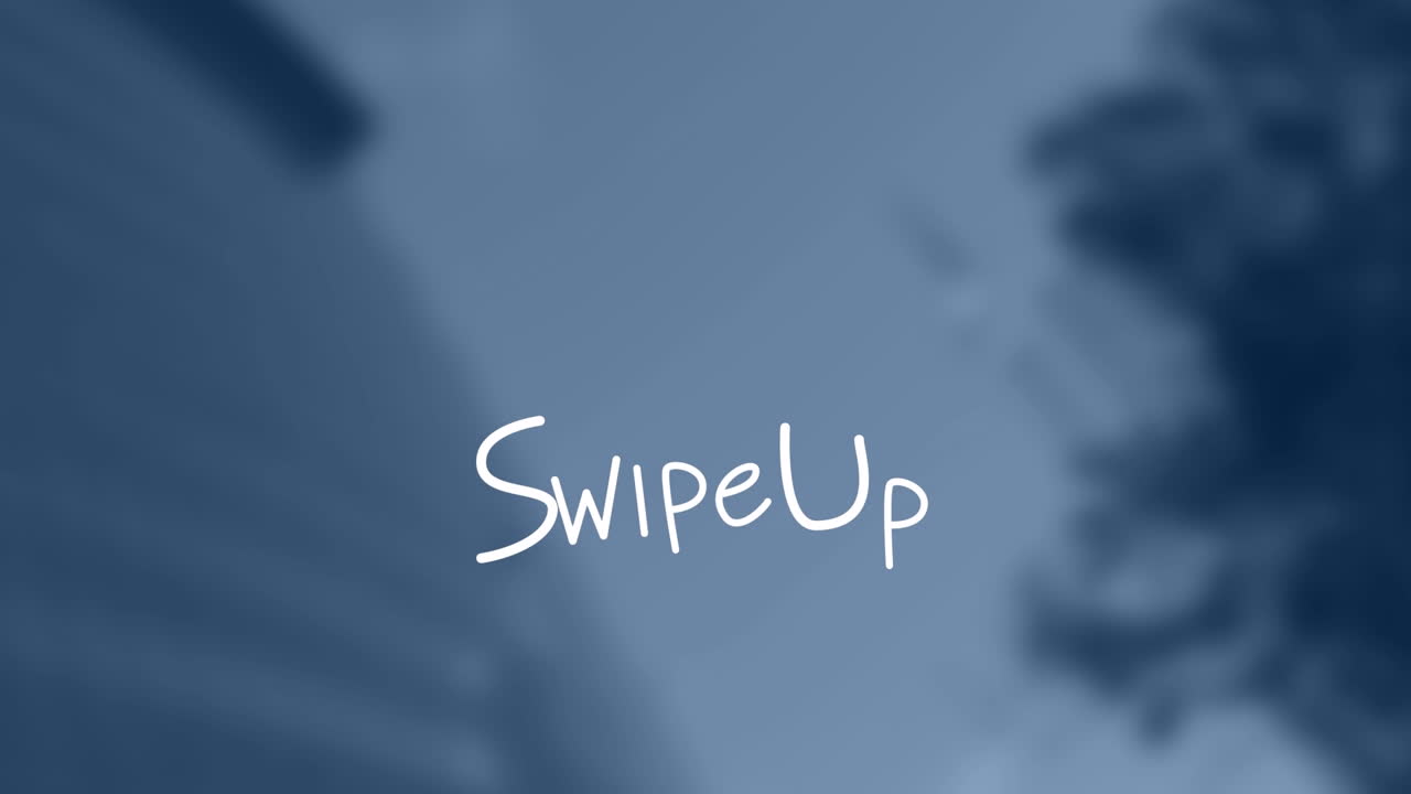 초점이 맞지 않은 도시 풍경 위에 있는 선으로 위로 스와이프 텍스트의 애니메이션