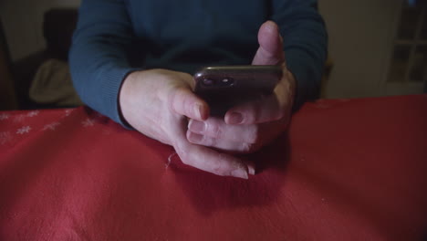 hands using smartphone then impatiently resting on table, parallax