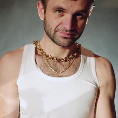 a gangster with handcuffs on his hands is trying to free himself. drug crime